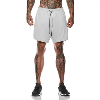 2020 dupla camada de cor sólida shorts masculinos muscular irmão de tamanho grande de fitness, esportes e casual calças shorts de fitness bolso interno